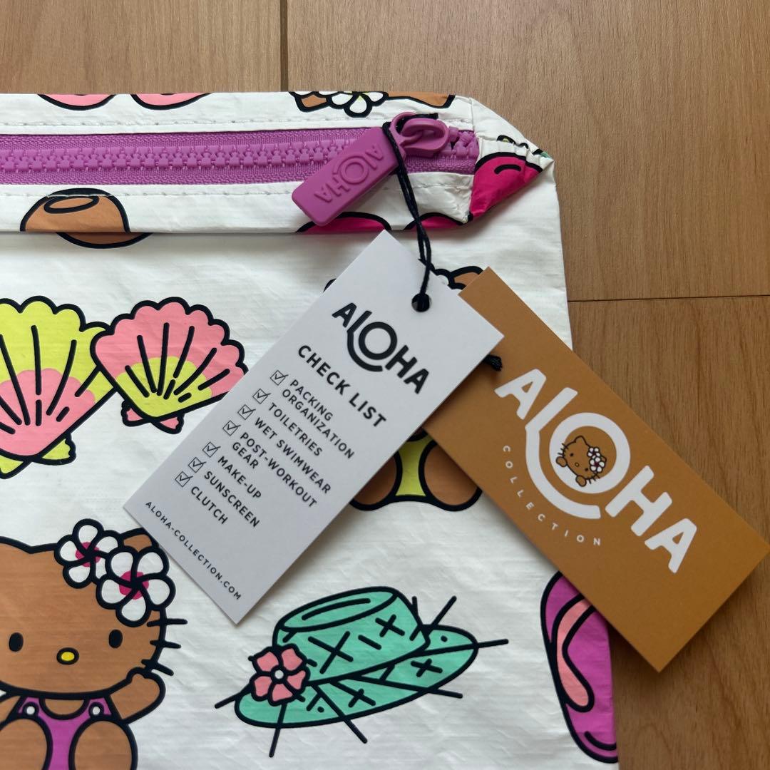 新品　Aloha Collection ハローキティ クラッチバッグ