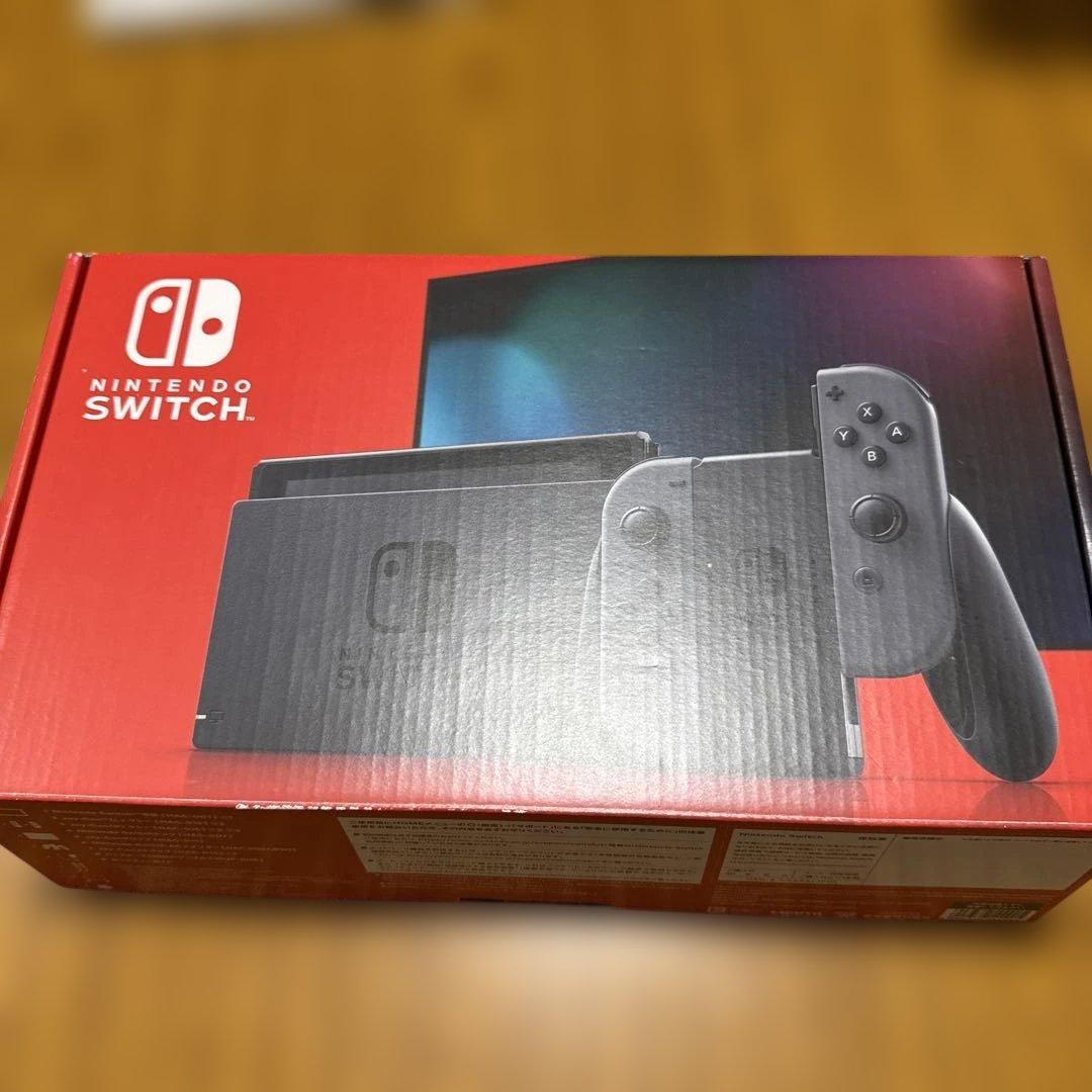 Nintendo Switch 本体 紫とオレンジのJoy-Conセット。