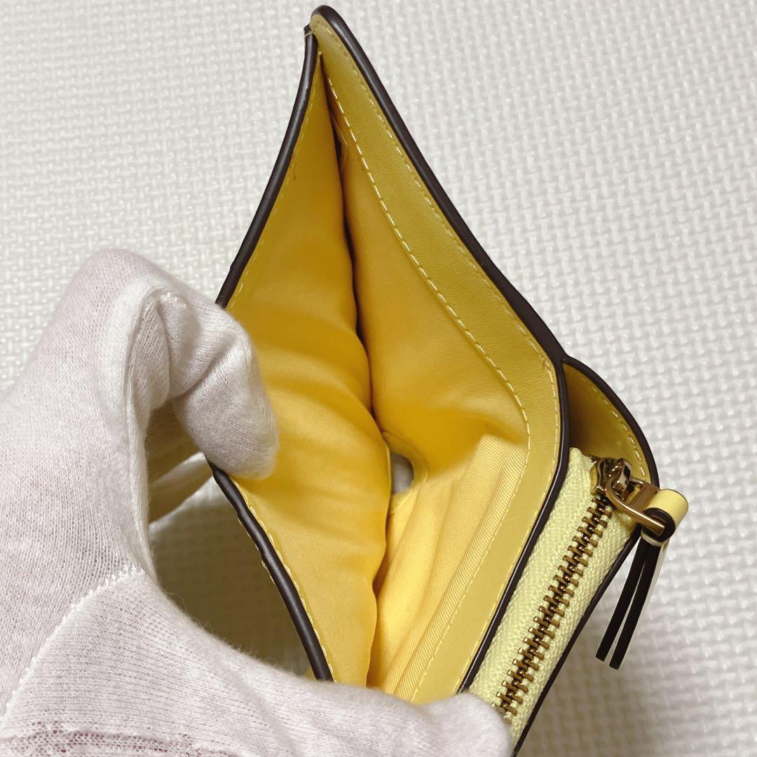 未使用TORY BURCH トリーバーチ 二つ折り財布 イエロー - メルカリ