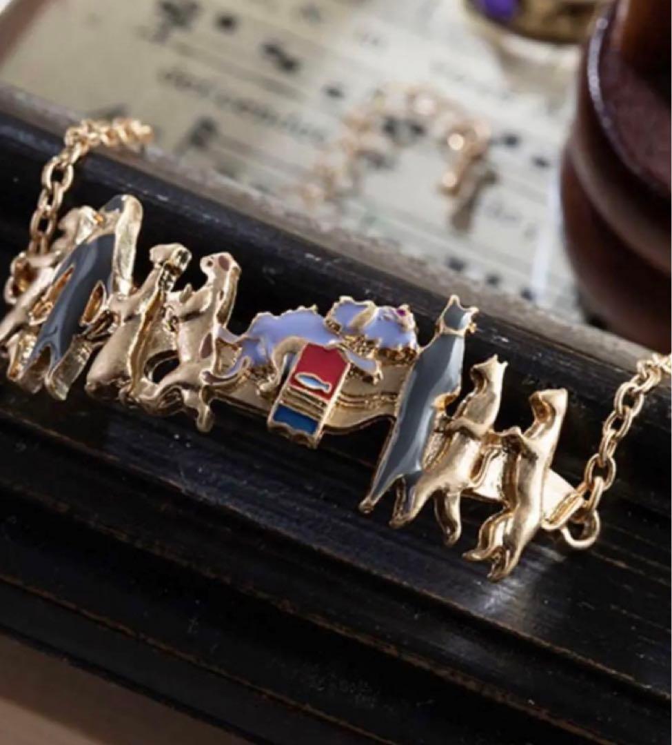 猫の恩返し 猫の行列ブレスレット - メルカリ